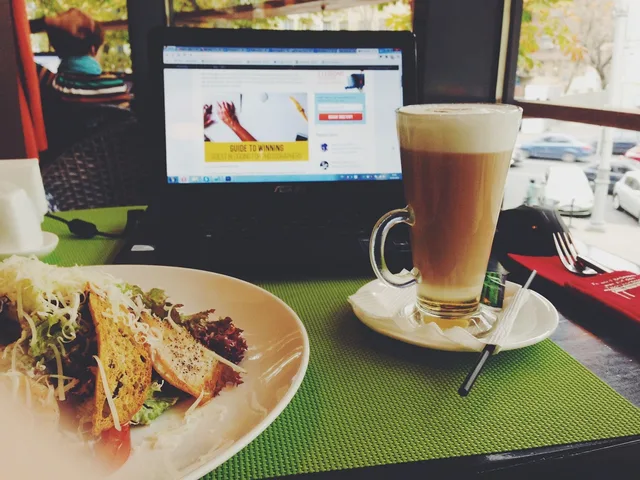 cafe, lunch, coffee, laptop, food, latte. Food creator partnerships commercial contracts explained