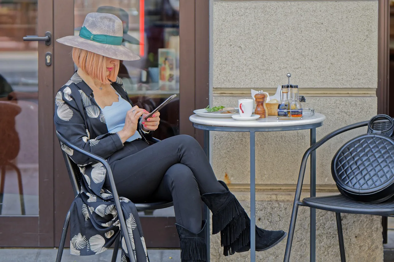 woman, restaurant, outdoors, fashion, hat, smartphone, sitting, terrace, foods, drinks