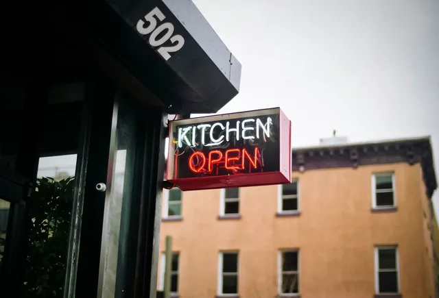 kitchen, open, sign, restaurant, food. Food creator UGC pricing: a UK restaurant budgeting guide